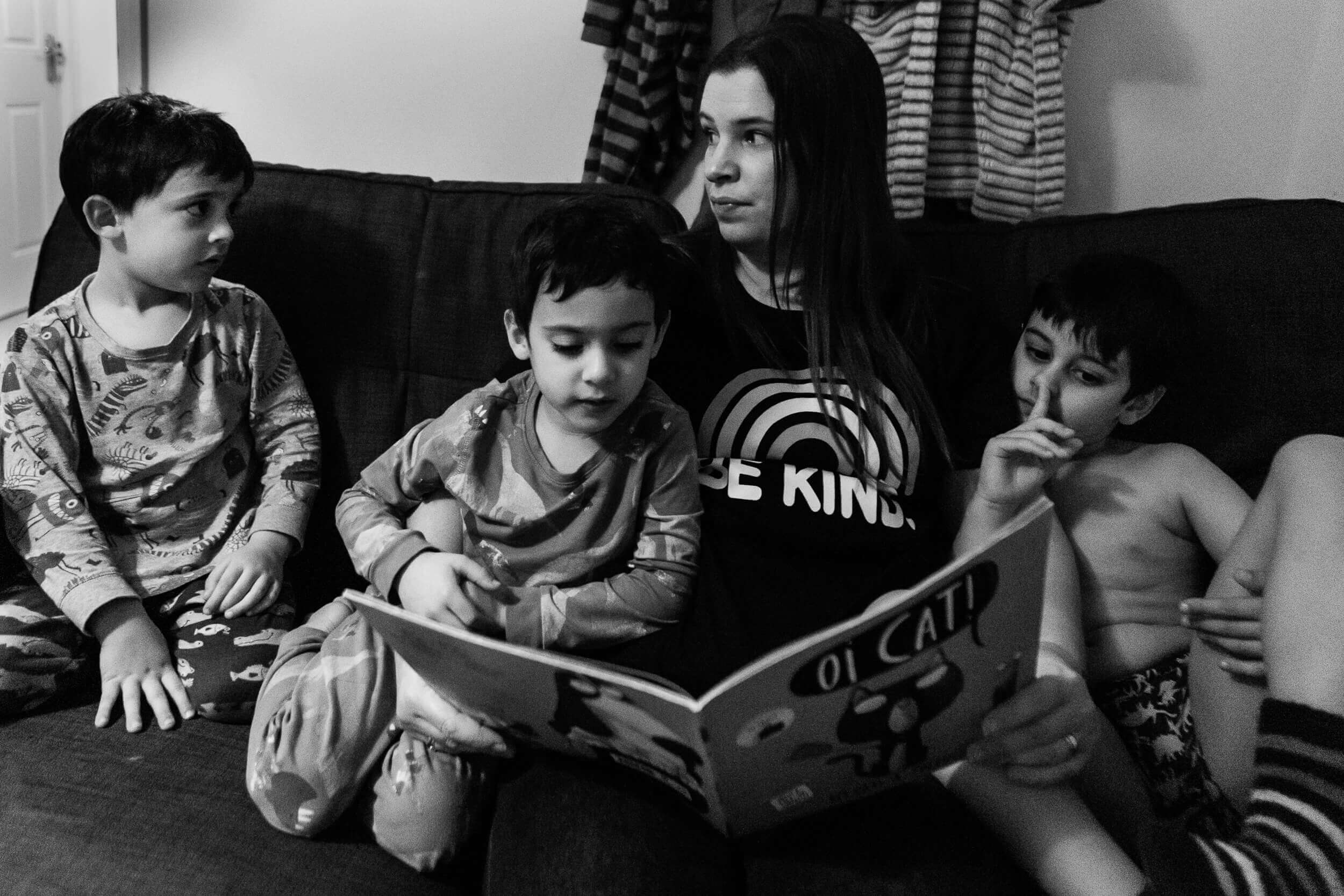 A mother reading a story to her three sons | Bristol family photographer