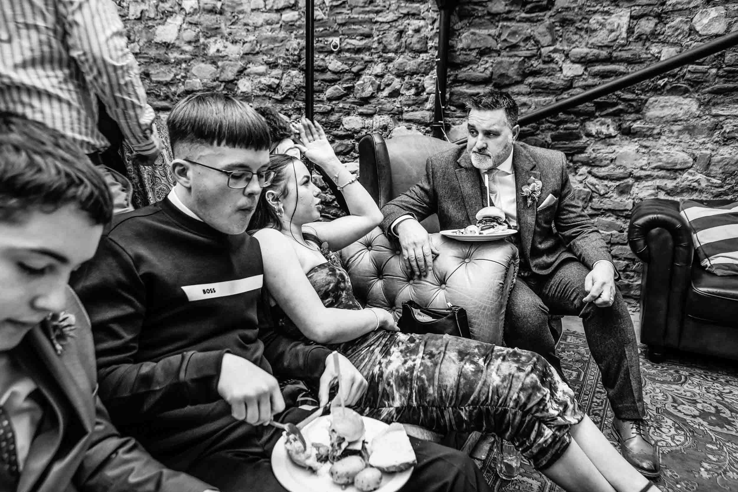 A groom chats with his daughter during his wedding at The Radnor Rooms in Bristol.