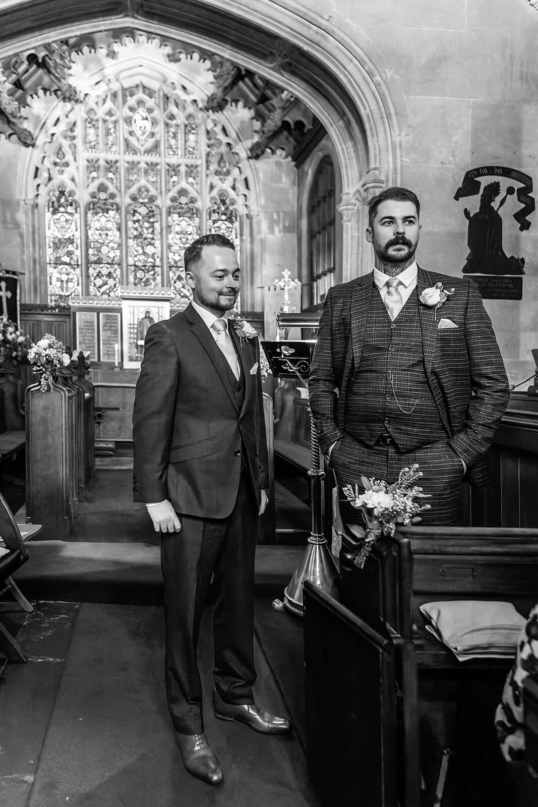 Groom and Best Man inside St Thomas à Becket church in Widcombe, Bath | Bath Wedding Photographer