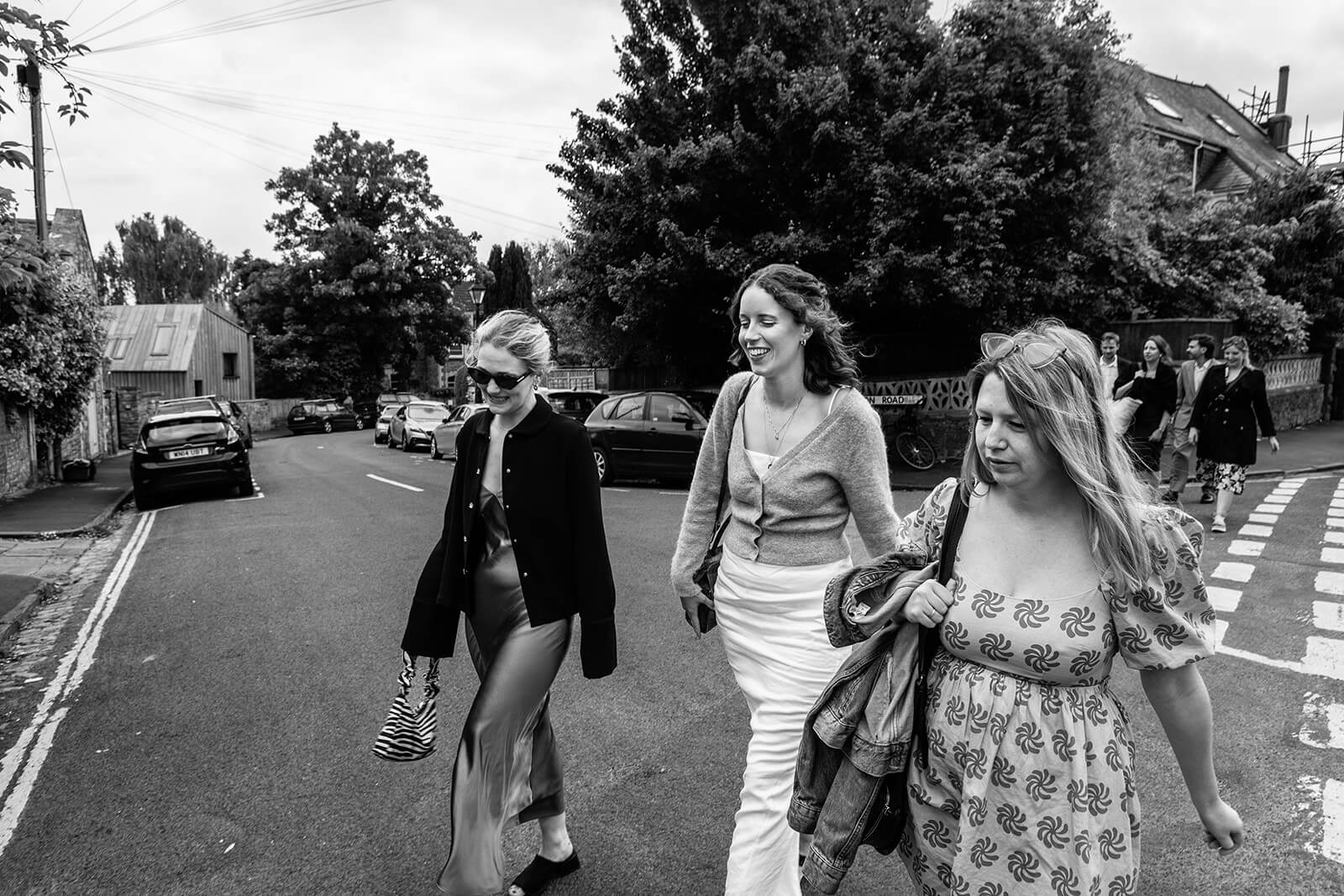 Wedding guests walking outside | Wedding Photographer Bristol