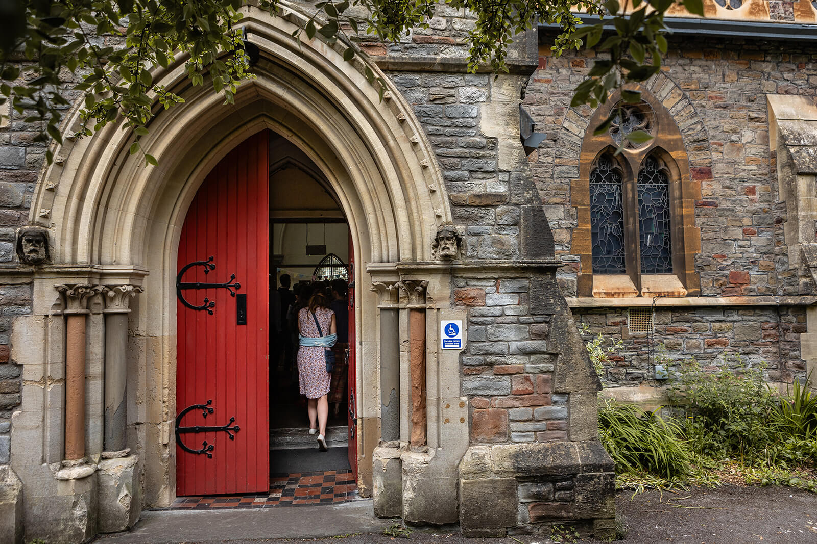 Wedding guests entering The Elmgrive Centre | Wedding Photographer Bristol