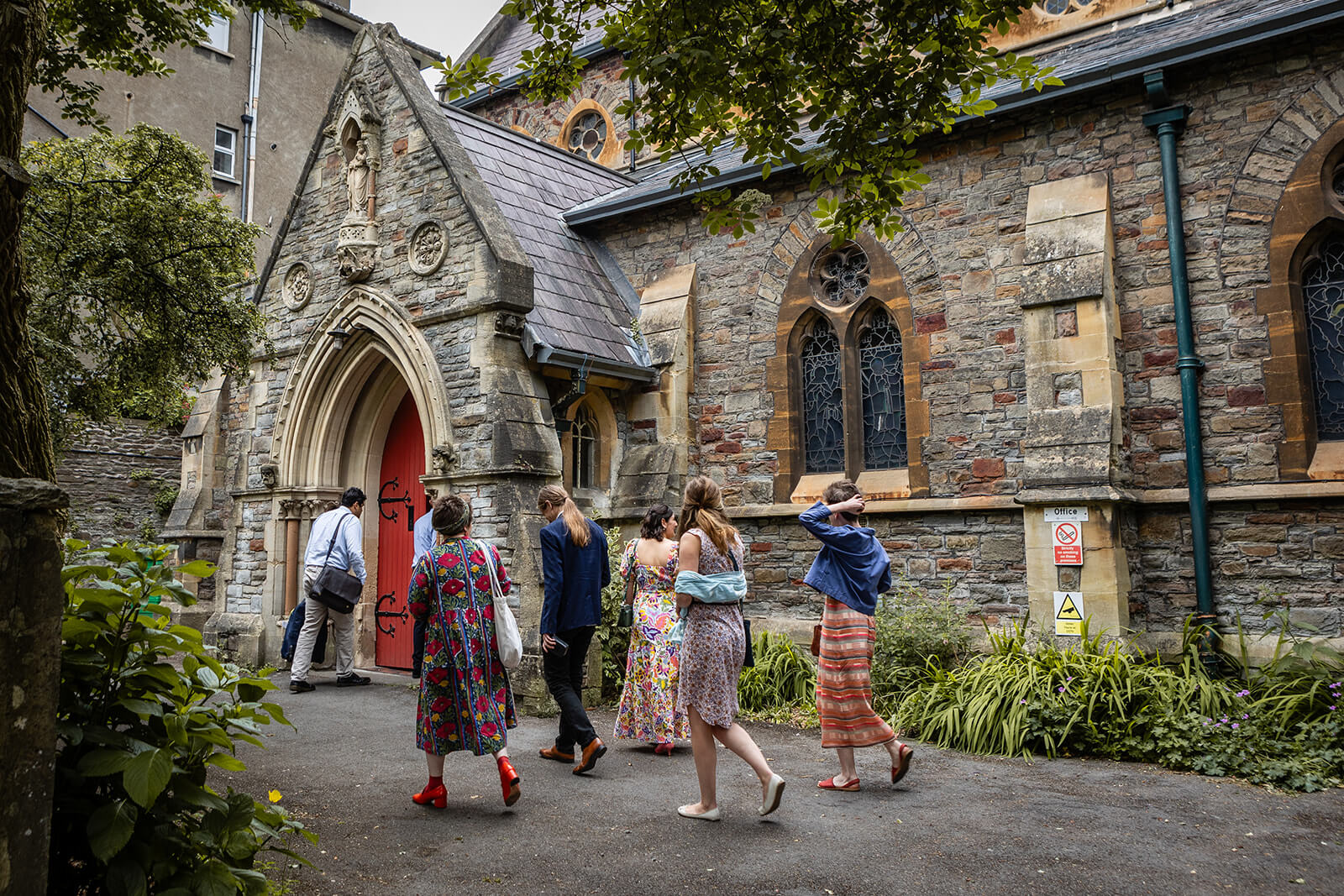 Wedding guests entering The Elmgrive Centre | Wedding Photographer Bristol