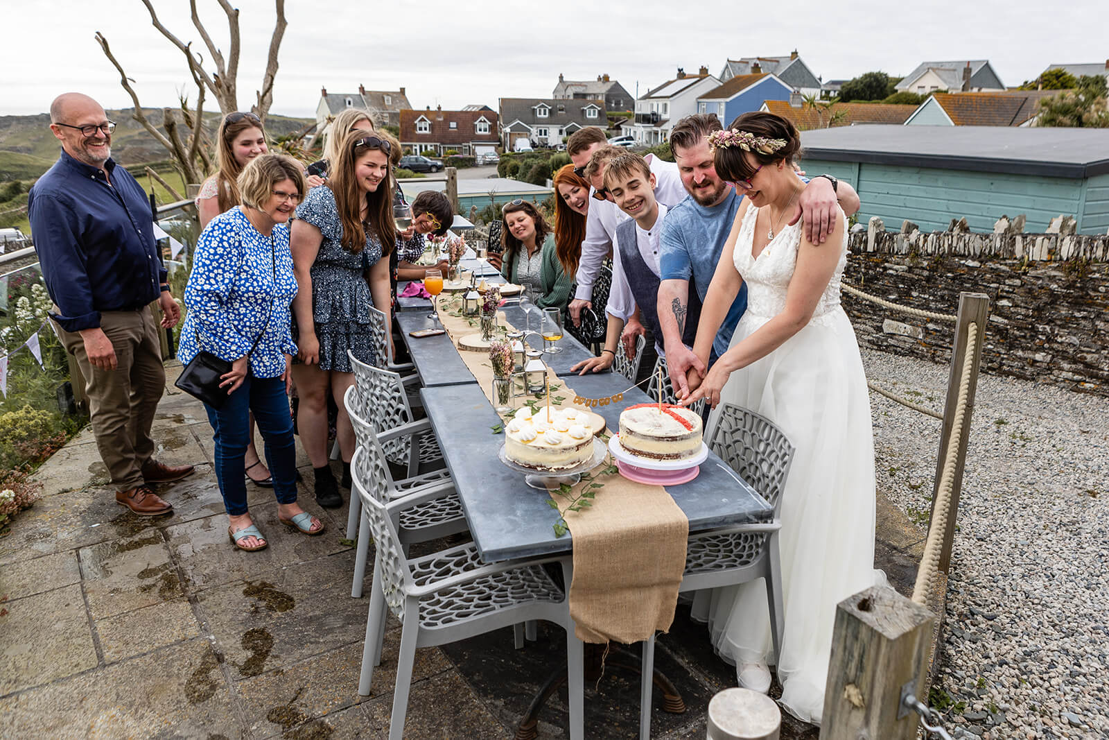 Cake cut at a coastal wedding | Rose Dedman Wedding Photographer UK