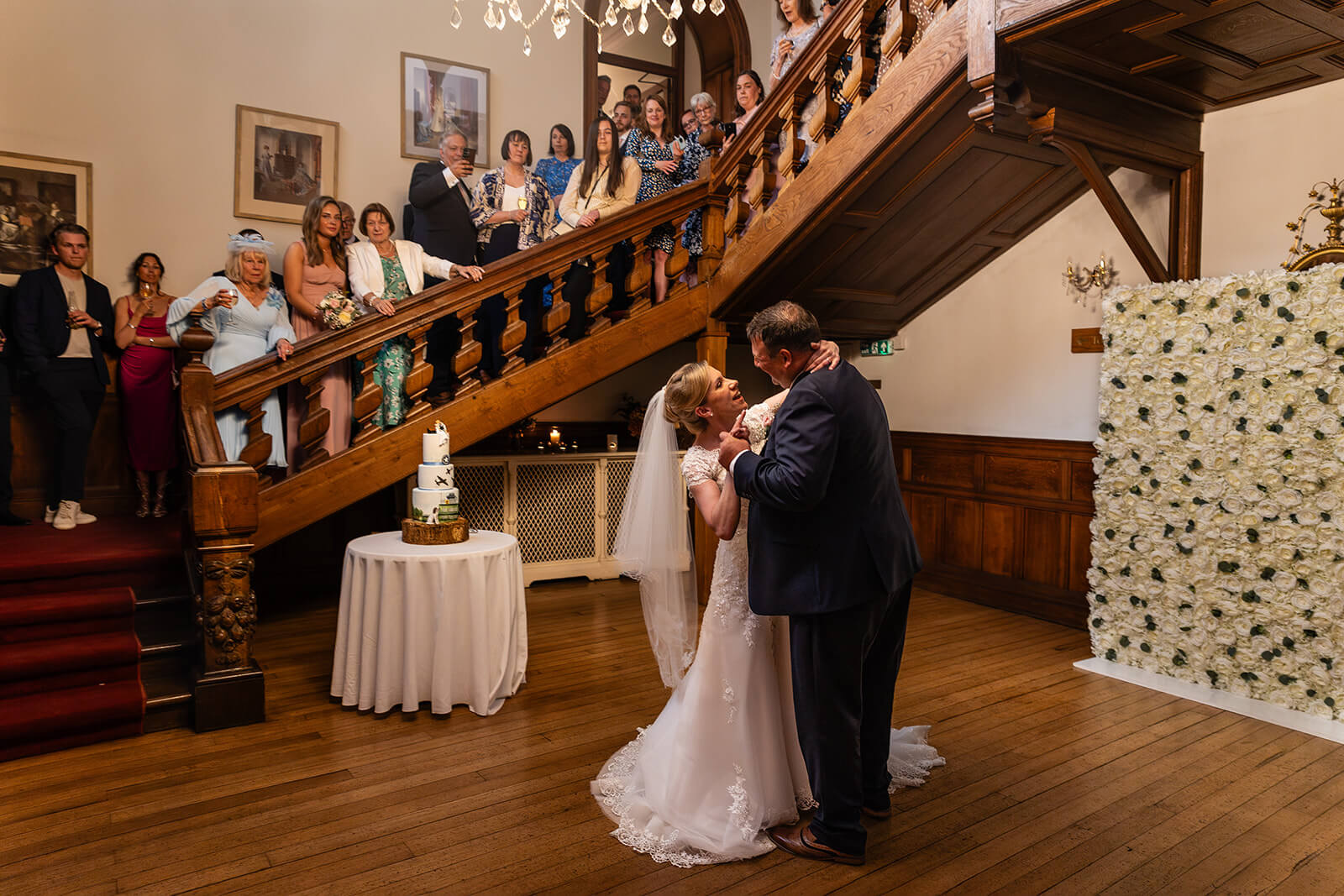 Bride and groom's first dance at wedding reception at Holmewood Hall | Wedding photographer Rose Dedman.