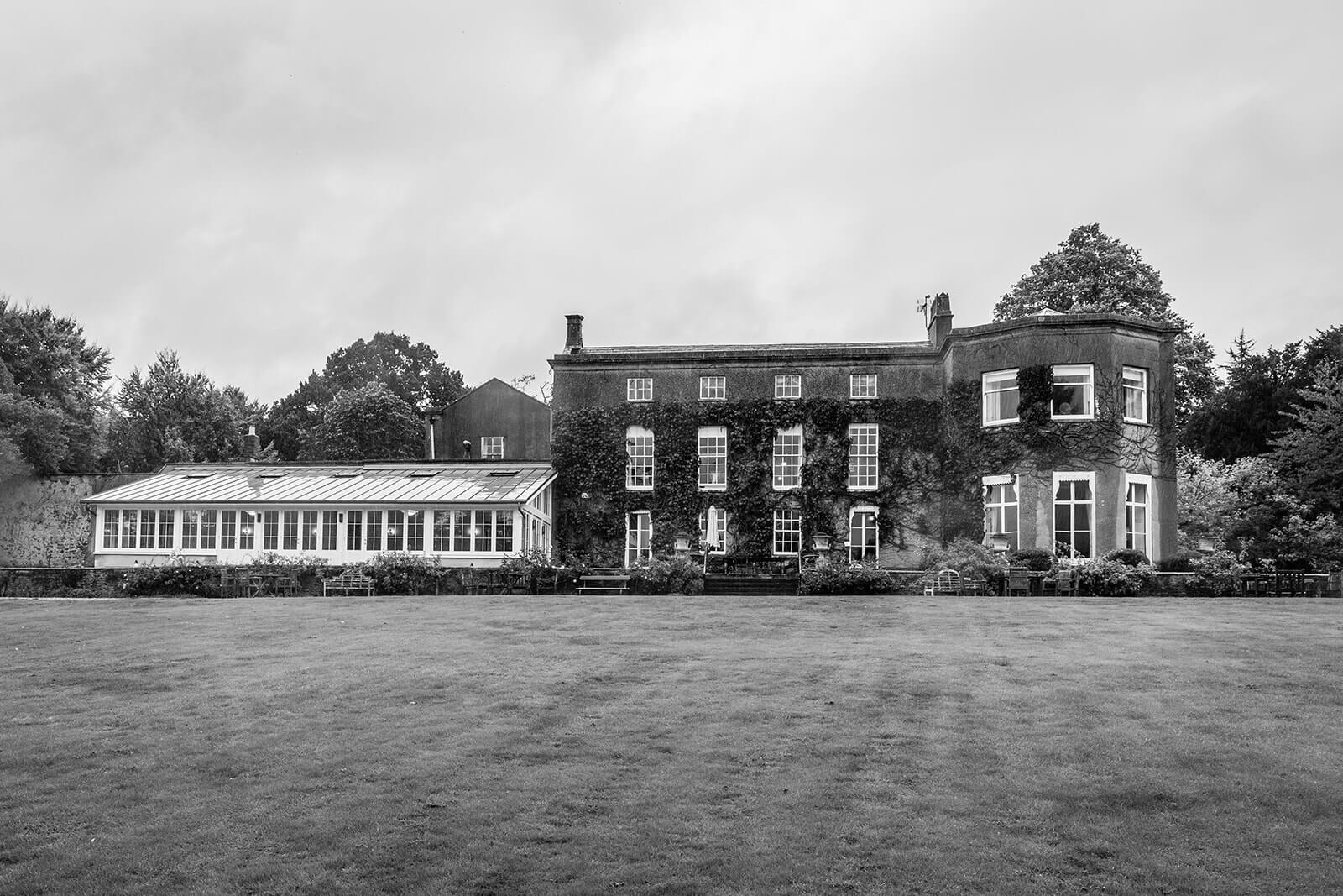 Pennard House historic wedding venue with garden view in Somerset, by Pennard House UK wedding photographer Rose Dedman.