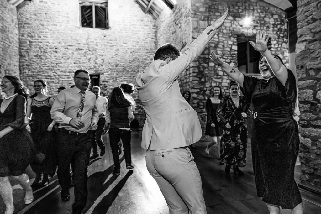 People dancing joyfully at a lively party.