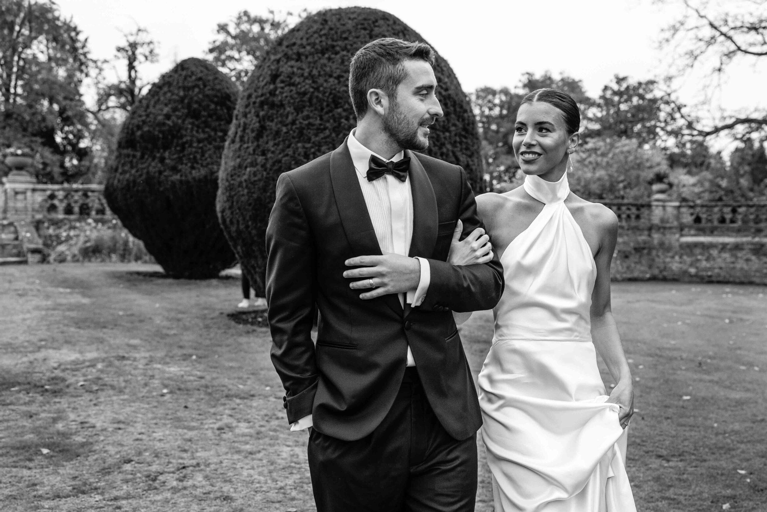 Bride and groom walking together | Babington House Wedding Guide | Wedding Photographer Rose Dedman