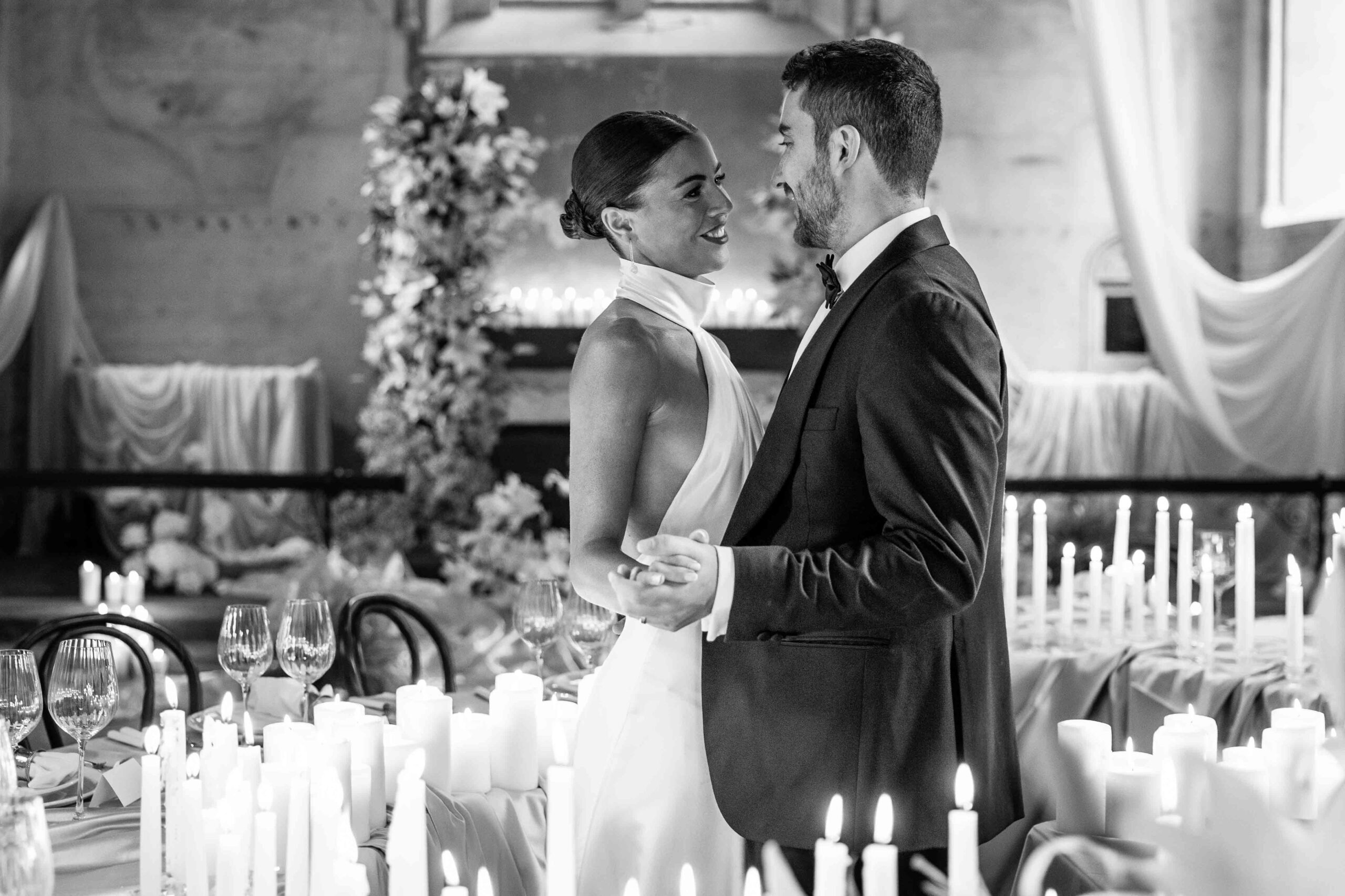 Bride and groom dancing at candlelit wedding reception in The Bell Tower on The Elvetham Estate | Wedding Photographer Rose Dedman