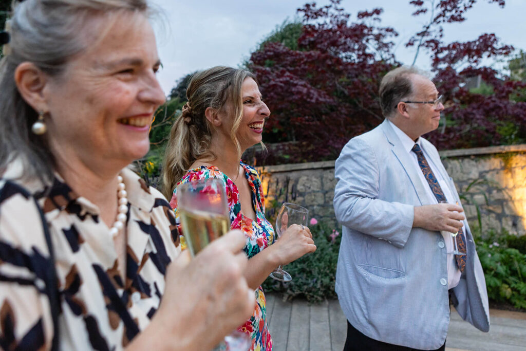 People celebrating with drinks outdoors.