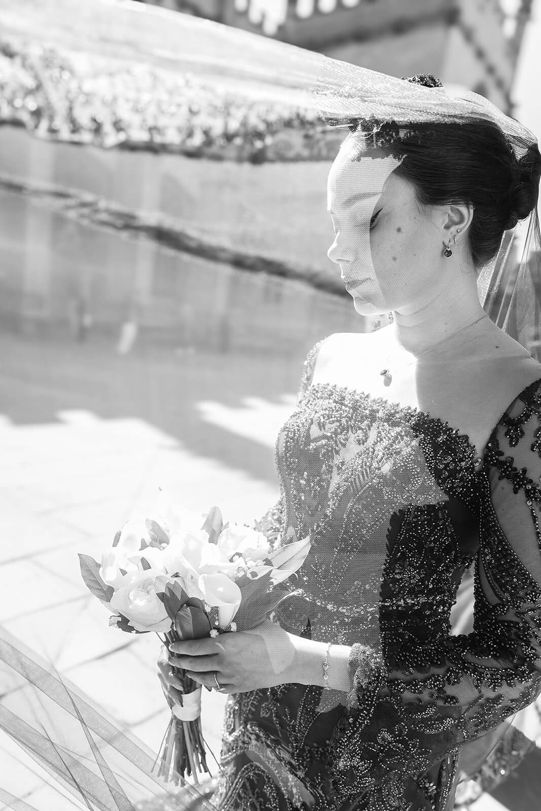 Bride with elegant veil and bouquet | Oxford Nikkah Wedding Photos