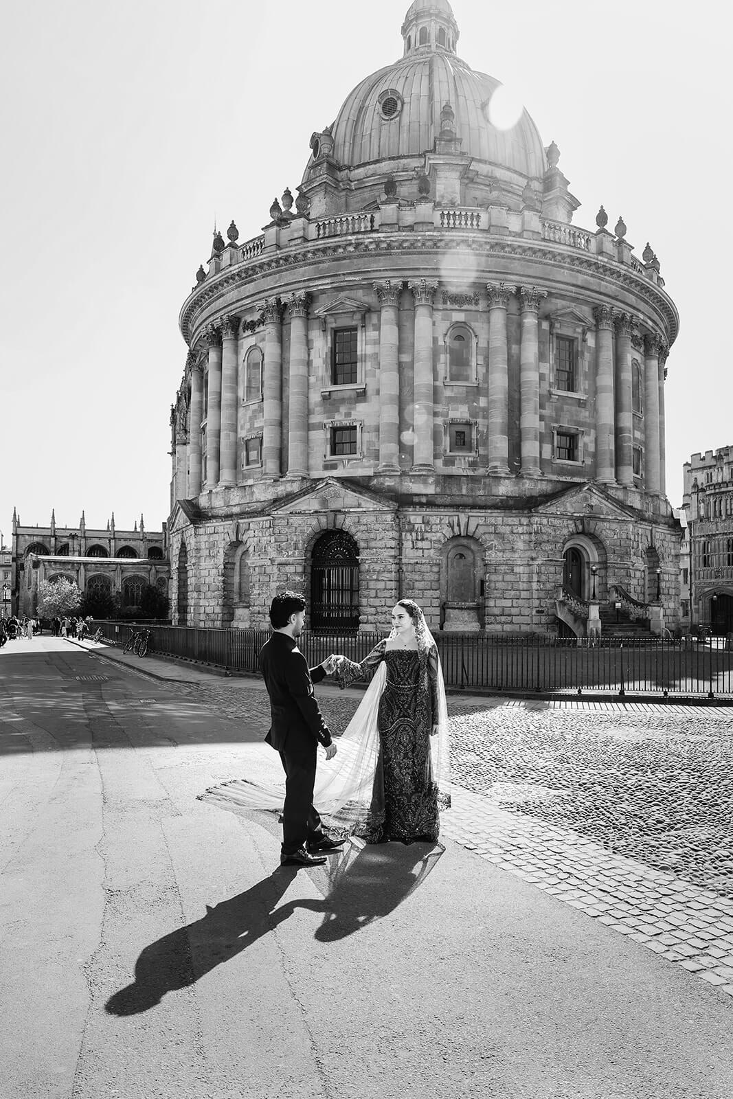 Bride and groom in front of The Radcliffe Camera in central Oxford | Oxford Nikkah wedding photographer