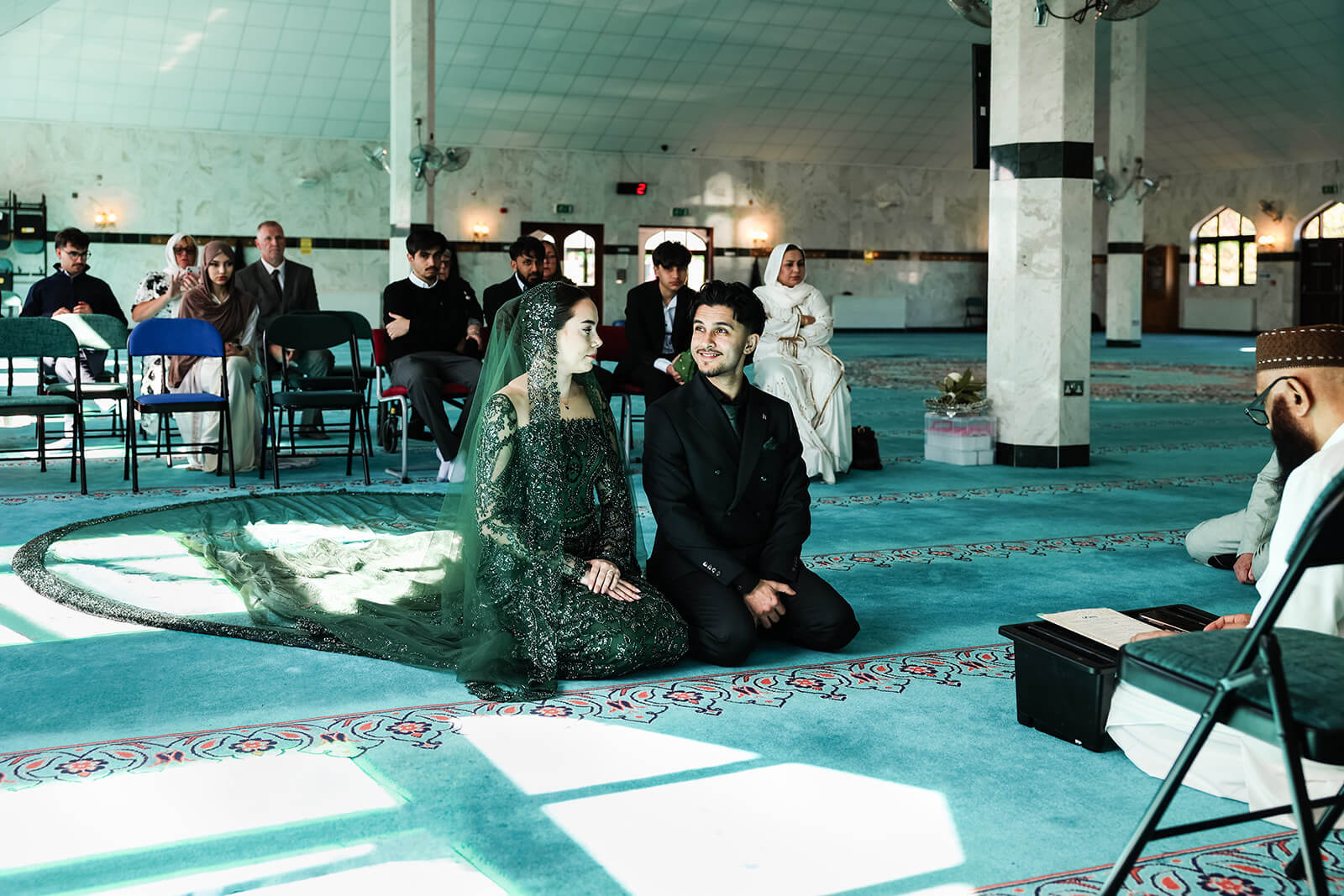 Couple in traditional Nikkah wedding ceremony in Oxford Central Mosque
