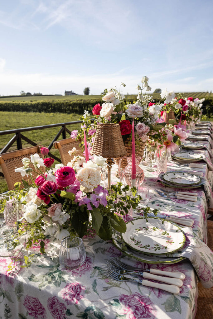 Outdoor floral table setting in countryside